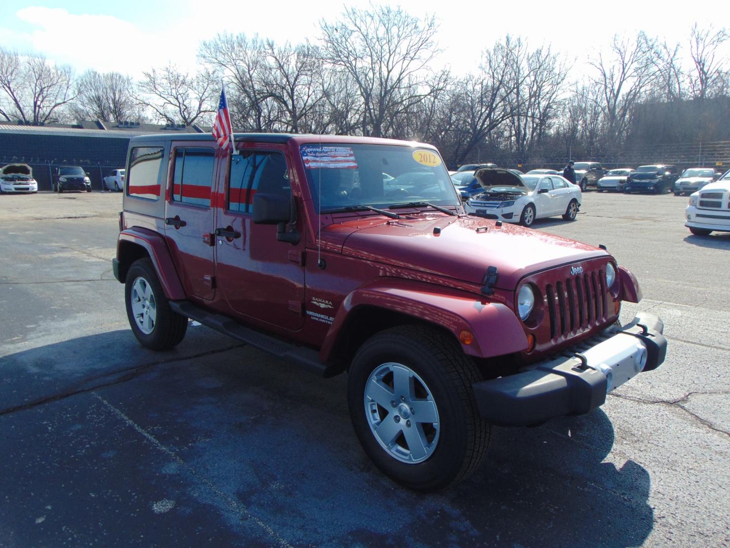 2012 BURGUNDY Jeep Wrangler (1C4HJWEG4CL) with an V6 3.6 Liter engine, Automatic, 5-Spd transmission, located at 2105 Dixie Hwy, Louisville, KY, 40210, (502) 772-3333, 38.220932, -85.795441 - Photo#4